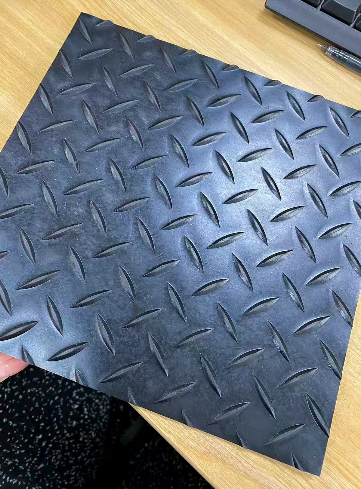 Diamond-pattern anti-slip rubber supplied by Fruges Arena