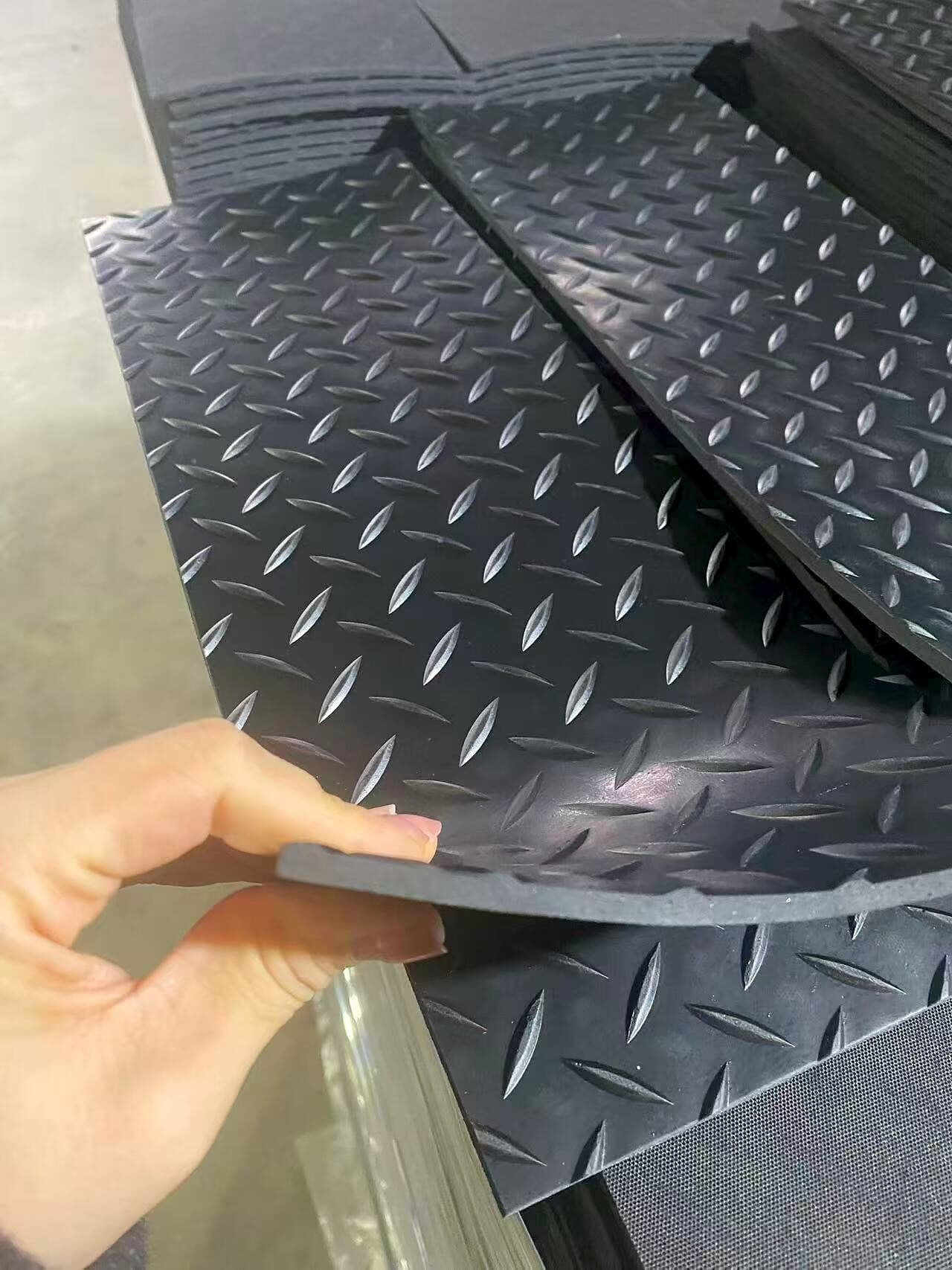 Diamond-pattern anti-slip rubber sheet stack