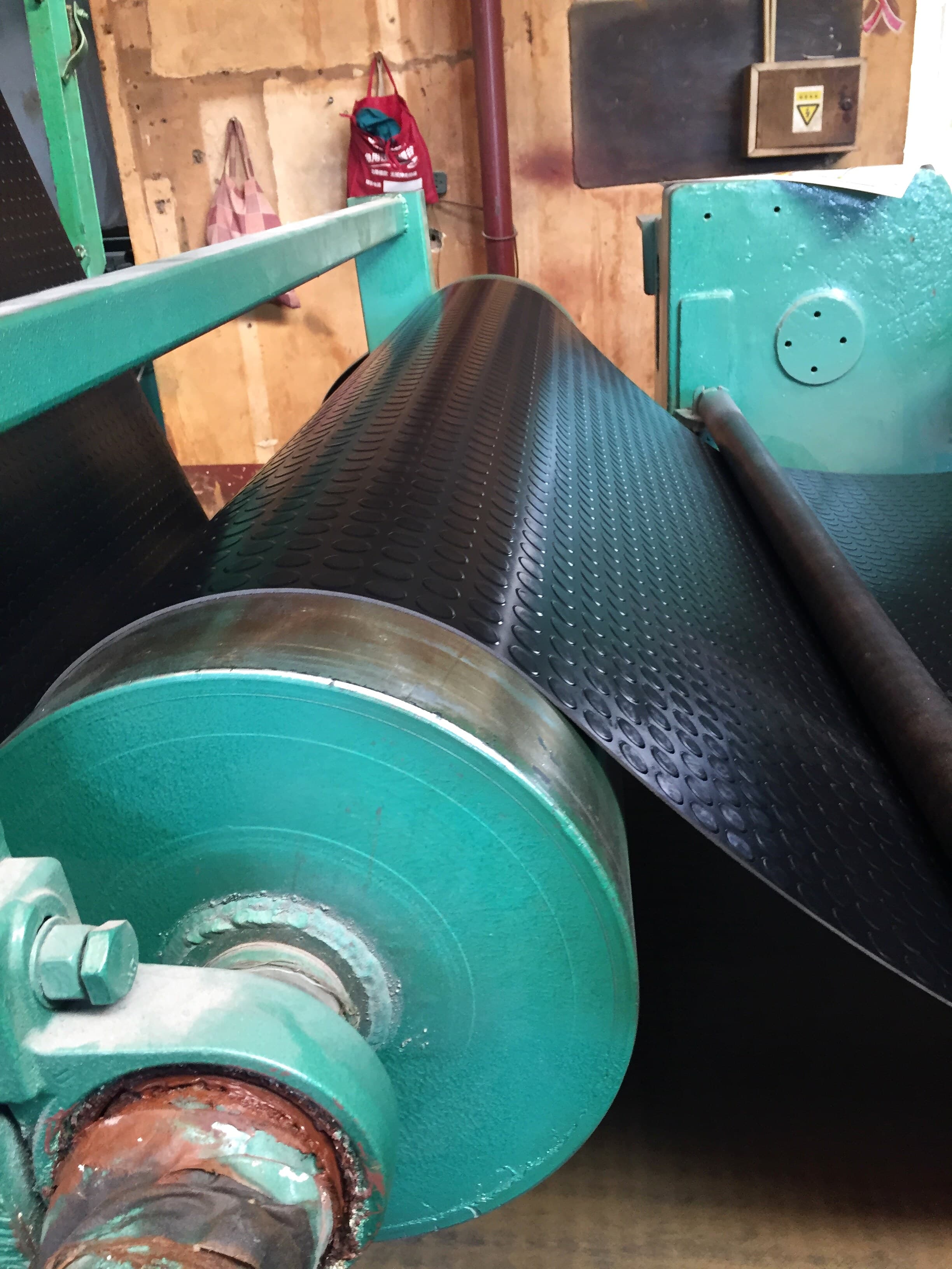 Coin-stud anti-slip rubber sheet close production view