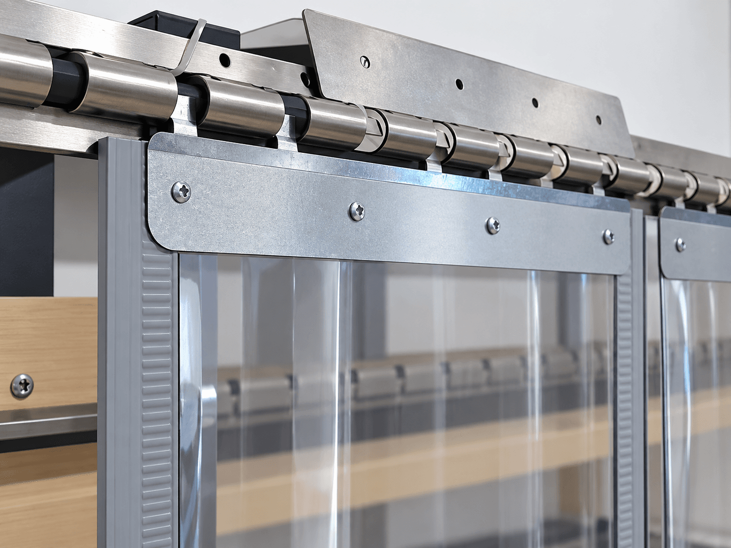 Representative illustration of the complete magnetic PVC strip curtain hanging system