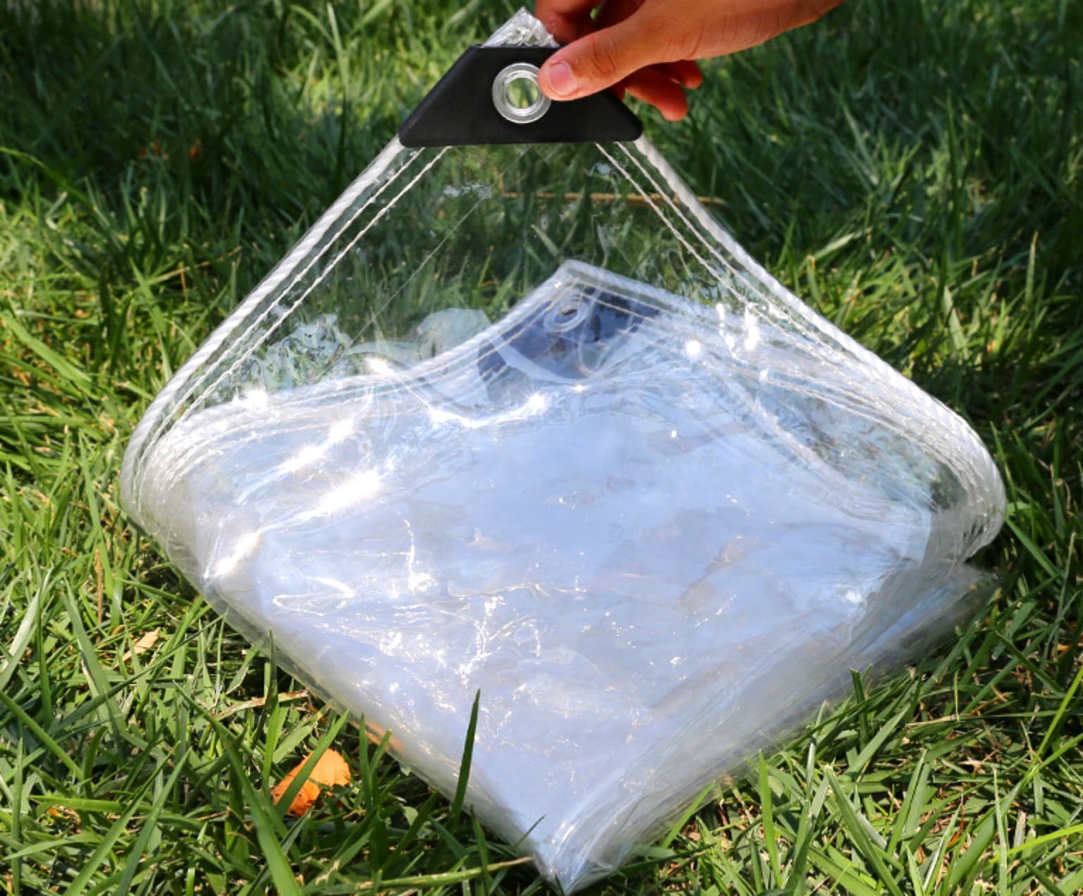 Transparent PVC tarpaulin folded product context; exact thickness and sheet dimensions are stated in the product listing